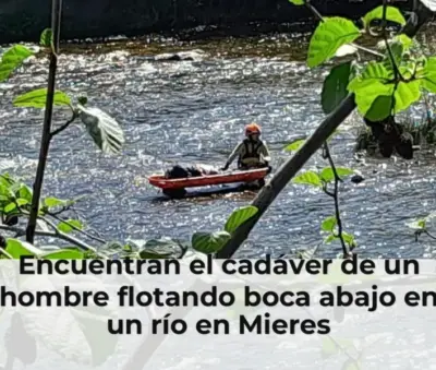 Encuentran el cadáver de un hombre flotando boca abajo en un río en Mieres